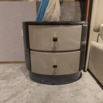 High-Gloss Round Nightstand with Grey Diagonal Pattern and Curved Cream Drawers